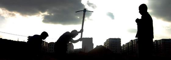 Workers at dusk